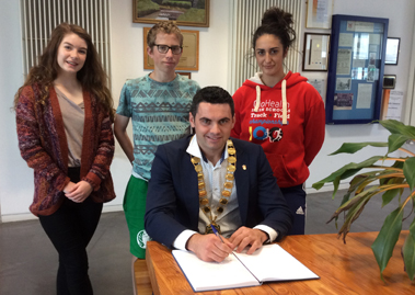 New Mayor of Letterkenny Municipal District Cllr. James Pat McDaid with Donegal Youth Councillors Megan Skinnader, Conor Farrell and Bridget McDyer signing the book of condolence in memory of those who were killed or injured in the Orlando tragedy earlier this week