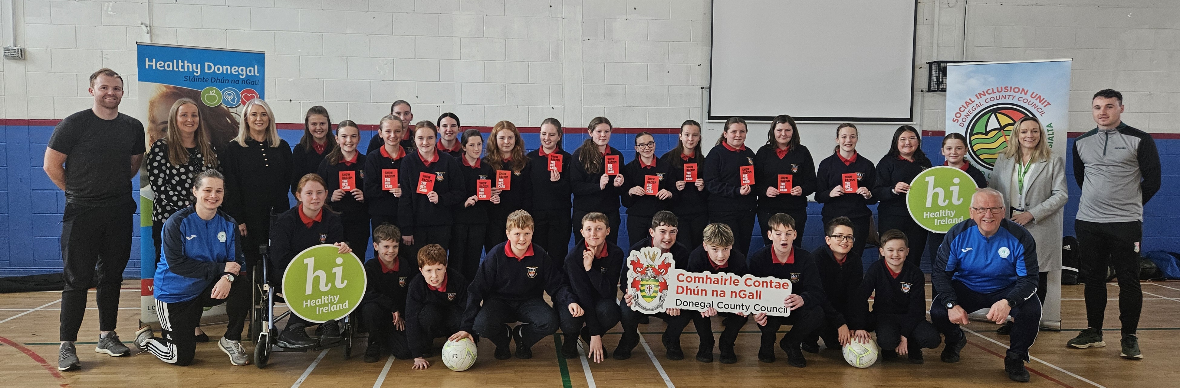 Margaret Fitzgerald, Healthy Ireland Coordinator, Donegal County Council and Rosita Mahony, Social Inclusion, Donegal County Council pictured with Emma Kane, A/Principal of Coláiste na Carraige, teachers Michael Patton and Danny McGlynn, first year students and Finn Harps staff at the launch of the Show Racism the Red Card Programme in Coláiste na Carraige.